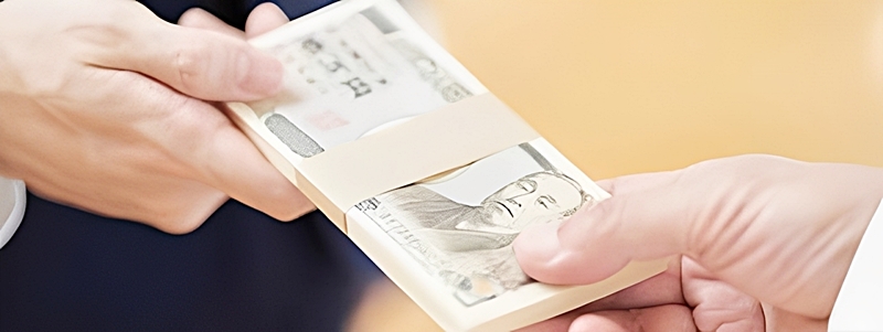 借金を返済する様子